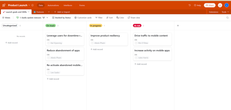 Airtable product launch board showing goals and OKRs categorized by status columns like On track, In progress, and At risk.